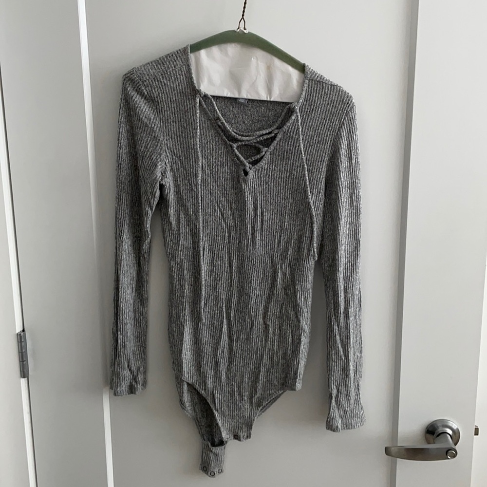 Grey crisscross body suit